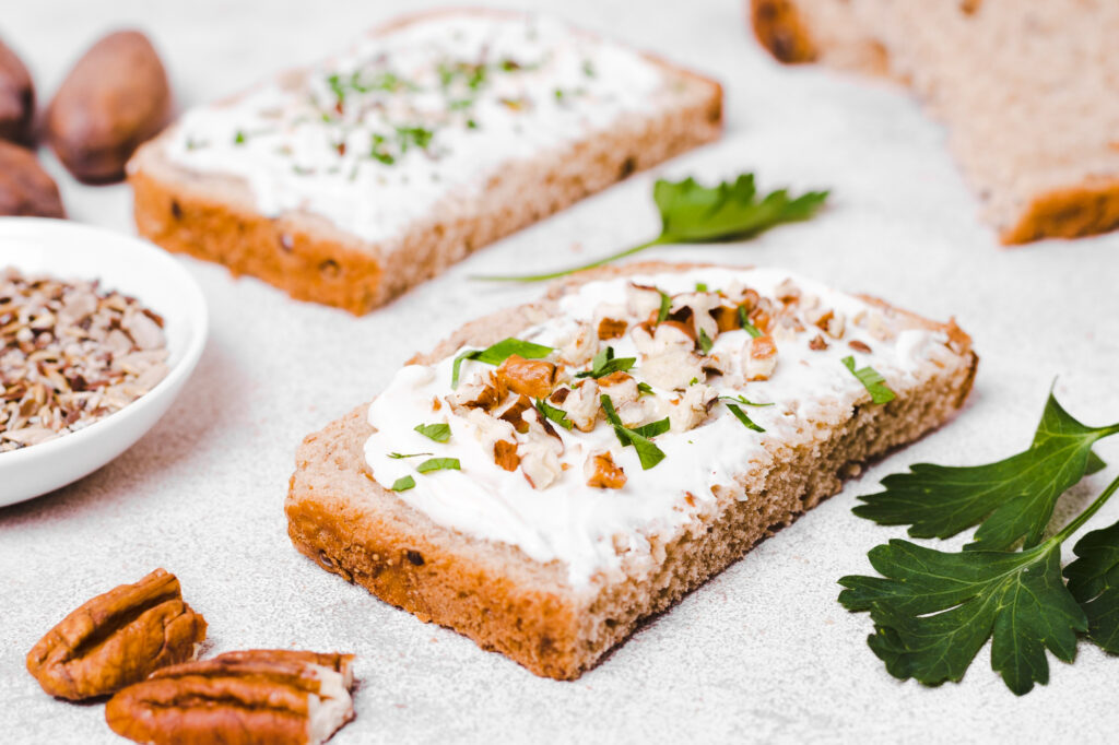 toast with spread and walnuts